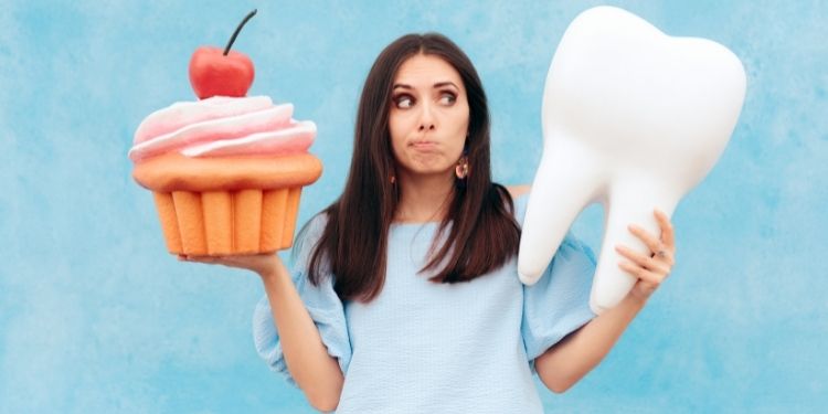 Consumaţi zahăr? Cum să vă păstraţi dinţii sănătoşi